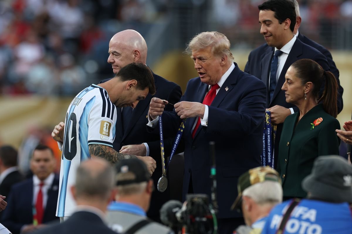 Donald Trump, president of the United States of America, Gianni Infantino, president of FIFA,  and Lionel Messi of Argentina are seen after the FIFA World Cup 2026 Final 
